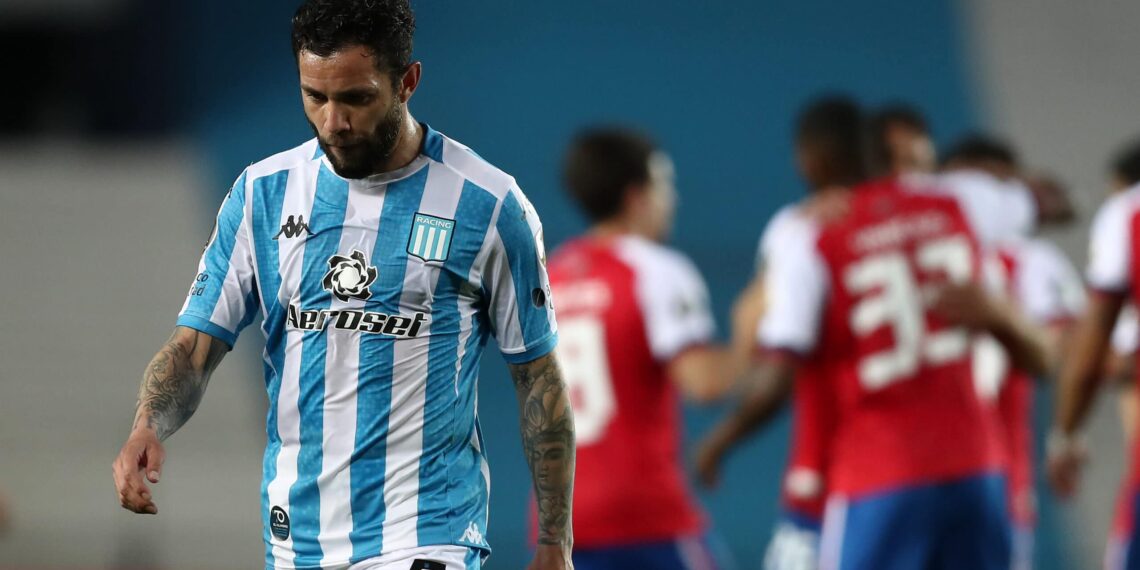 AVELLANEDA, ARGENTINA - SEPTEMBER 17: Eugenio Mena of Racing Club looks dejected after  a group F match of Copa CONMEBOL Libertadores 2020 between Racing and Nacional at Juan Domingo Peron Stadium on September 17, 2020 in Avellaneda, Argentina. All games of the tournament are played behind closed doors to avoid spread of COVID-19.  (Photo by Agustin Marcarian- Pool/Getty Images)