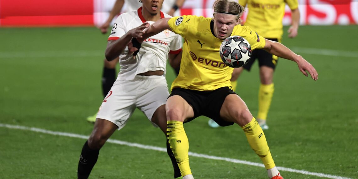 February 17, 2021, Sevilla, Spain: Jules Kounde of Sevilla FC in action with Erling Haaland of Borussia Dortmund during the UEFA Champions League match between Sevilla FC and Borussia Dortmund at Estadio Sanchez Pizjuan in Sevilla, Spain. Sevilla Spain - ZUMAd159 20210217_zia_d159_065 Copyright: xJosexLuisxContrerasx