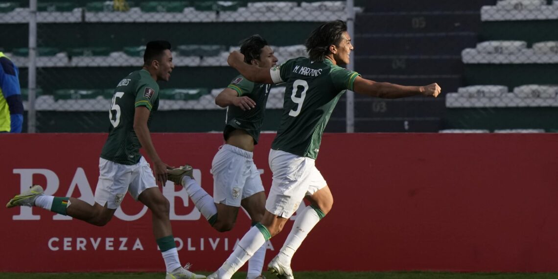 MIRAFLORES, BOLIVIA - OCTOBER 14: Victor Abrego of Bolivia celebrates with Marcelo Moreno Martins of Bolivia after scoring the third goal of his team during a match between Bolivia and Paraguay as part of South American Qualifiers for Qatar 2022 at Estadio Hernando Siles on October 14, 2021 in Miraflores, Bolivia. (Photo by Juan Karita - Pool/Getty Images)
