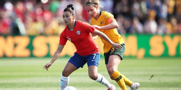 PENRITH, AUSTRALIA - NOVEMBER 10: Maria Jose Rojas of Chile is challenged by Elise Kellond-Knight of Australia during the International Friendly match between the Australian Matildas and Chile at Panthers Stadium on November 10, 2018 in Penrith, Australia. (Photo by Matt King/Getty Images)