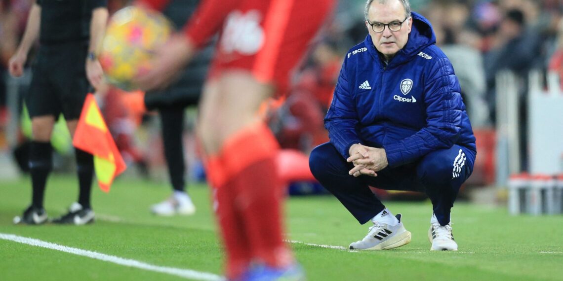 Leeds United's Argentinian head coach Marcelo Bielsa reacts during the English Premier League football match between Liverpool and Leeds at the Anfield stadium, in Liverpool, north west England on February 23, 2022. - - RESTRICTED TO EDITORIAL USE. No use with unauthorized audio, video, data, fixture lists, club/league logos or 'live' services. Online in-match use limited to 120 images. An additional 40 images may be used in extra time. No video emulation. Social media in-match use limited to 120 images. An additional 40 images may be used in extra time. No use in betting publications, games or single club/league/player publications. (Photo by Lindsey Parnaby / AFP) / RESTRICTED TO EDITORIAL USE. No use with unauthorized audio, video, data, fixture lists, club/league logos or 'live' services. Online in-match use limited to 120 images. An additional 40 images may be used in extra time. No video emulation. Social media in-match use limited to 120 images. An additional 40 images may be used in extra time. No use in betting publications, games or single club/league/player publications. / RESTRICTED TO EDITORIAL USE. No use with unauthorized audio, video, data, fixture lists, club/league logos or 'live' services. Online in-match use limited to 120 images. An additional 40 images may be used in extra time. No video emulation. Social media in-match use limited to 120 images. An additional 40 images may be used in extra time. No use in betting publications, games or single club/league/player publications. (Photo by LINDSEY PARNABY/AFP via Getty Images)