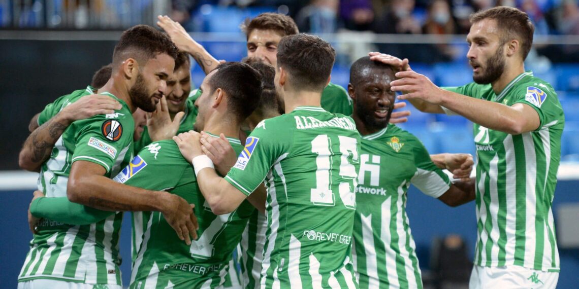 Real Betis players celebrate after scoring during the UEFA Europa League play-off, 1st leg football match between FC Zenit St. Petersburg and Real Betis Balompie in Saint Petersburg on February 17, 2022. (Photo by Olga MALTSEVA / AFP) (Photo by OLGA MALTSEVA/AFP via Getty Images)