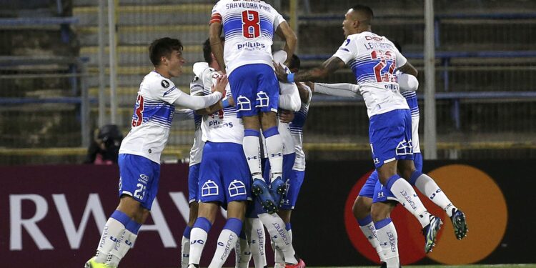 Chile's Universidad Catolica players celebrate a goal during the Copa Libertadores football tournament group stage match between Chile's Universidad Catolica and Colombia's Atletico Nacional at the San Carlos de Apoquindo in Santiago, on May 26, 2021. (Photo by CLAUDIO REYES / AFP) (Photo by CLAUDIO REYES/AFP via Getty Images)