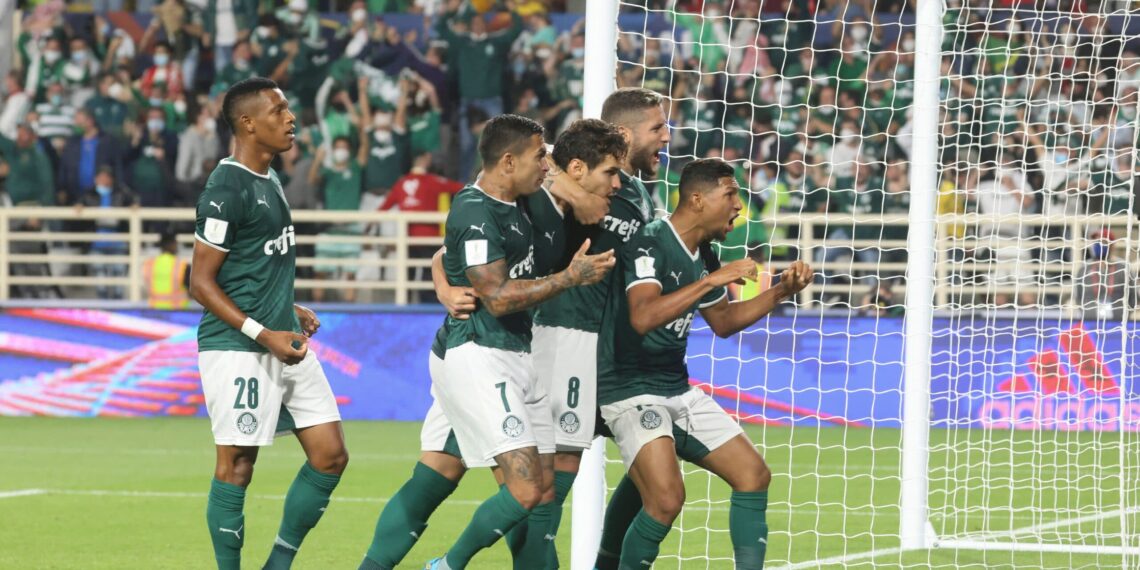 Palmeiras' players celebrate their opening goal during the 2021 FIFA Club World Cup semi-final football match between Egypt's Al-Ahly and Brazil's Palmeiras at al-Nahyan Stadium in Abu Dhabi, on February 8, 2022. (Photo by Karim SAHIB / AFP) (Photo by KARIM SAHIB/AFP via Getty Images)