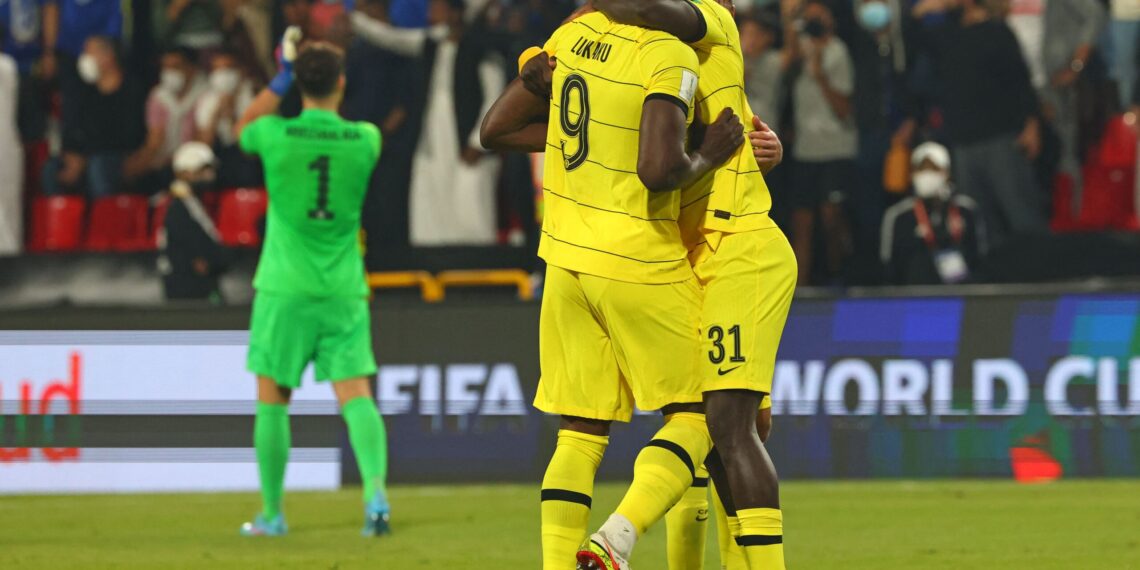Chelsea's forward Romelu Lukaku hugs Chelsea's defender Malang Sarr as they celebrate winning the 2021 FIFA Club World Cup semi-final football match against Saudi's Al-Hilal at Mohammed Bin Zayed stadium in Abu Dhabi, on February 9, 2022. (Photo by Giuseppe CACACE / AFP) (Photo by GIUSEPPE CACACE/AFP via Getty Images)