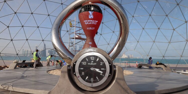 This picture shows the countdown clock along the Doha Corniche, on February 3, 2022, as Qatar prepares to host the FIFA World Cup 2022. (Photo by KARIM JAAFAR / AFP) (Photo by KARIM JAAFAR/AFP via Getty Images)