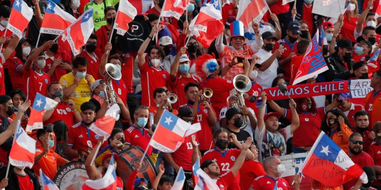 Chilean fans are seen on the stands before the South American qualification football match for the FIFA World Cup Qatar 2022 between Chile and Argentina at Zorros del Desierto Stadium in Calama, Chile on January 27, 2022. (Photo by Javier Torres / POOL / AFP) (Photo by JAVIER TORRES/POOL/AFP via Getty Images)