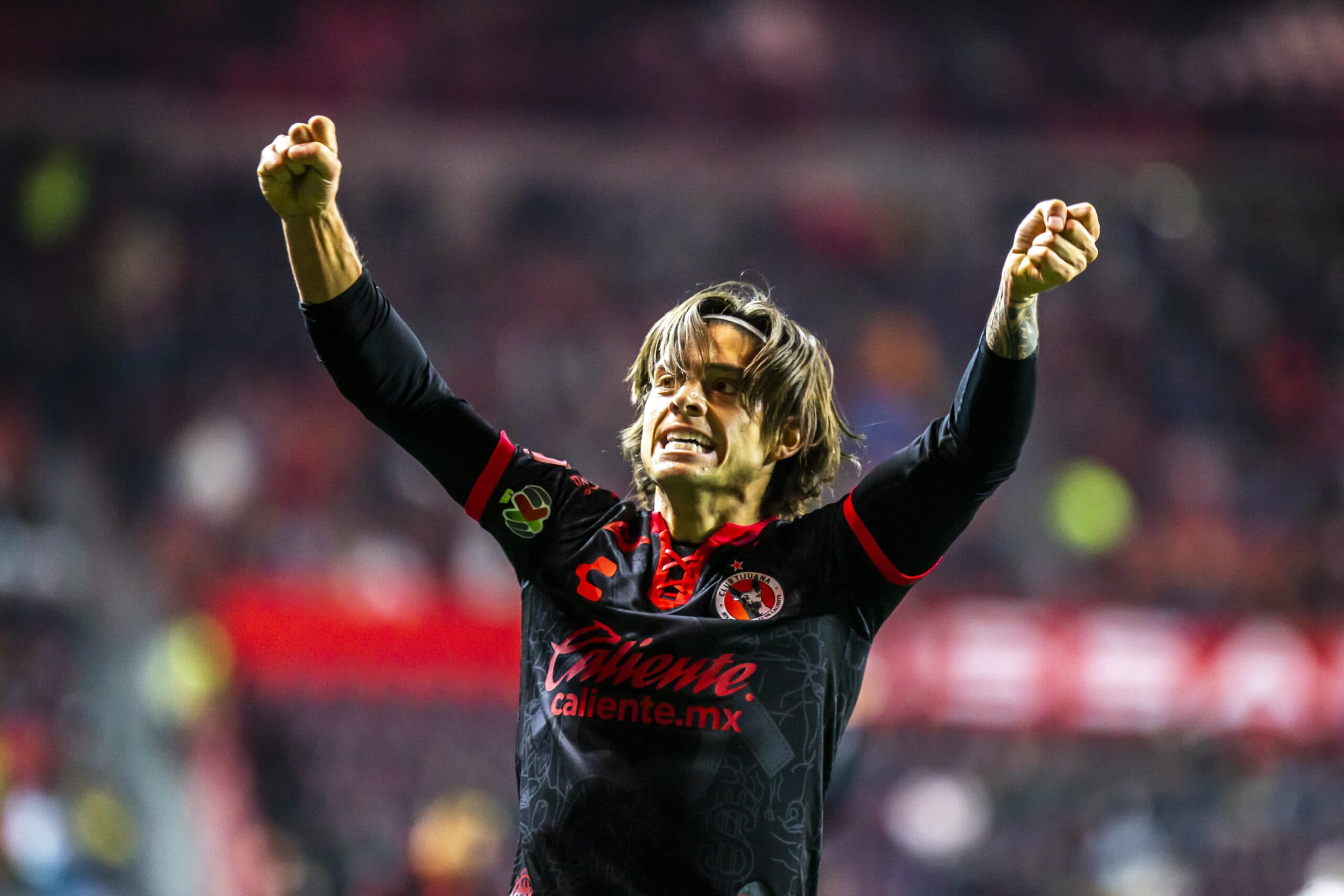 TIJUANA, MEXICO - FEBRUARY 05: Joaquin Montecinos of Tijuana celebrates his team's victory after the 4th round match between Club Tijuana and Pumas UNAM as part of the Torneo Grita Mexico C22 Liga MX at Caliente Stadium on February 5, 2022 in Tijuana, Mexico. (Photo by Francisco Vega/Getty Images)