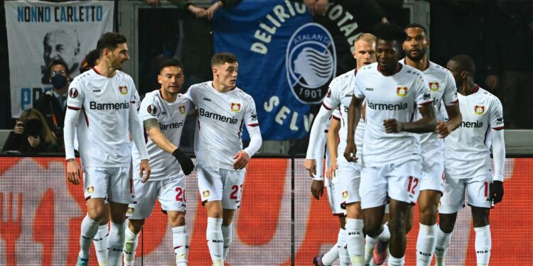 Leverkusen's Chilean midfielder Charles Aranguiz (2ndL) celebrates with teammates after opening the scoring during the UEFA Europa League round of 16, 1st leg football match between Atalanta and Leverkusen on March 10, 2022 at the Azzurri d'Italia stadium in Bergamo. (Photo by MIGUEL MEDINA / AFP) (Photo by MIGUEL MEDINA/AFP via Getty Images)