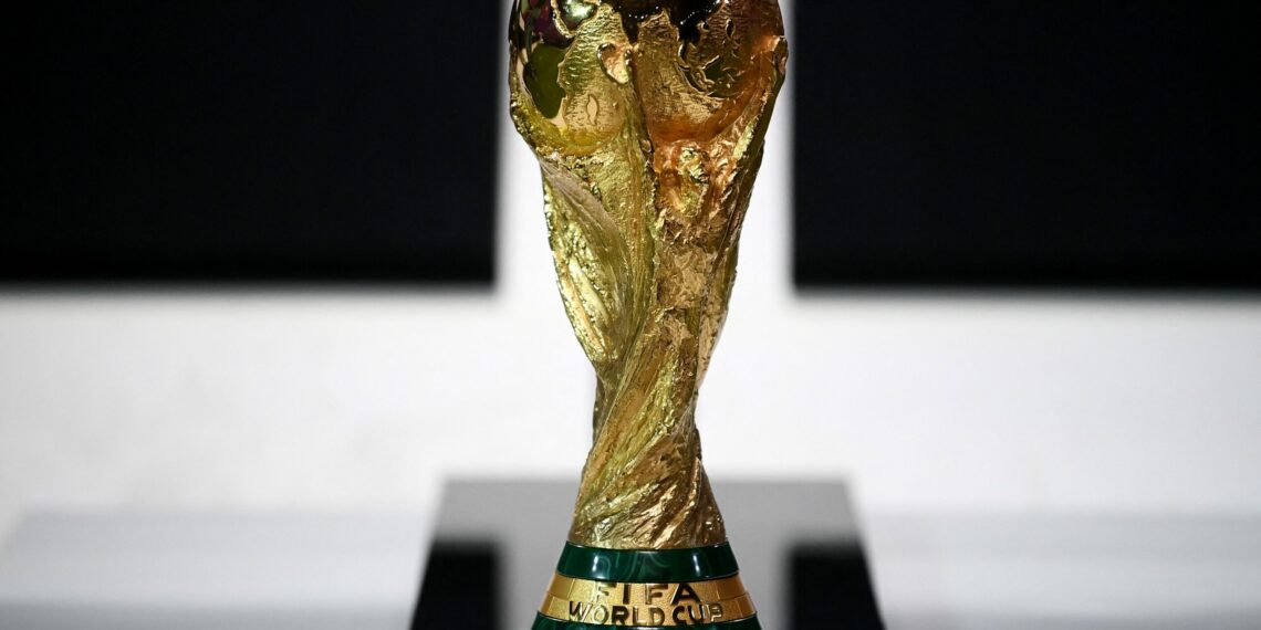 A picture taken on March 31, 2022 shows the World Cup Trophy during the 
FIFA Congress in the Qatari capital Doha. - The countdown towards the most controversial World Cup in history begins tomorrow as the draw for Qatar 2022 takes place in Doha 2022, less than eight months befor the start of the tournament itself. (Photo by FRANCK FIFE / AFP) (Photo by FRANCK FIFE/AFP via Getty Images)