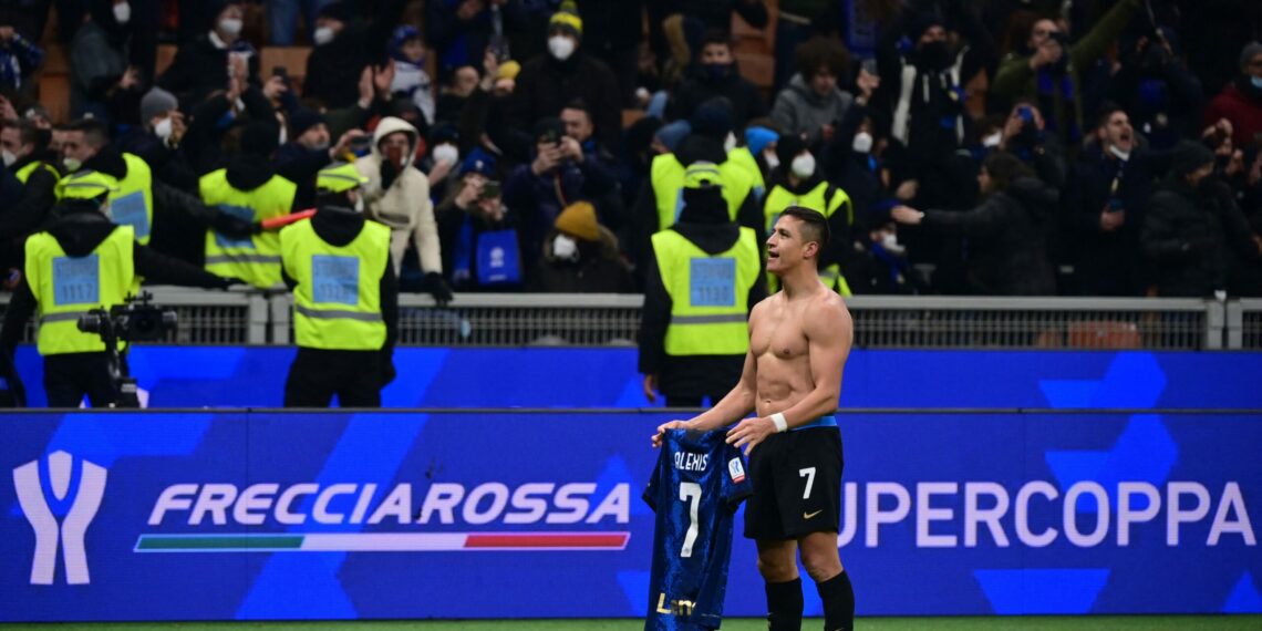 Inter Milan's Chilean forward Alexis Sanchez celebrates after scoring a last second winning goal during the Italian Super Cup (Supercoppa italiana) football match between Inter and Juventus on January 12, 2022 at the San Siro stadium in Milan. (Photo by MIGUEL MEDINA / AFP) (Photo by MIGUEL MEDINA/AFP via Getty Images)