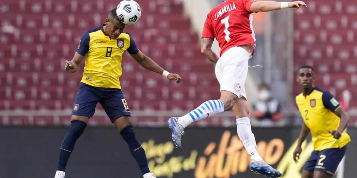 Ecuador's Carlos Gruezo (L) and Paraguay's Luis Amarilla vie for the ball during their South American qualification football match for the FIFA World Cup Qatar 2022 at the Rodrigo Paz Delgado Stadium in Quito on September 2, 2021. (Photo by Dolores Ochoa / various sources / AFP) (Photo by DOLORES OCHOA/AFP via Getty Images)