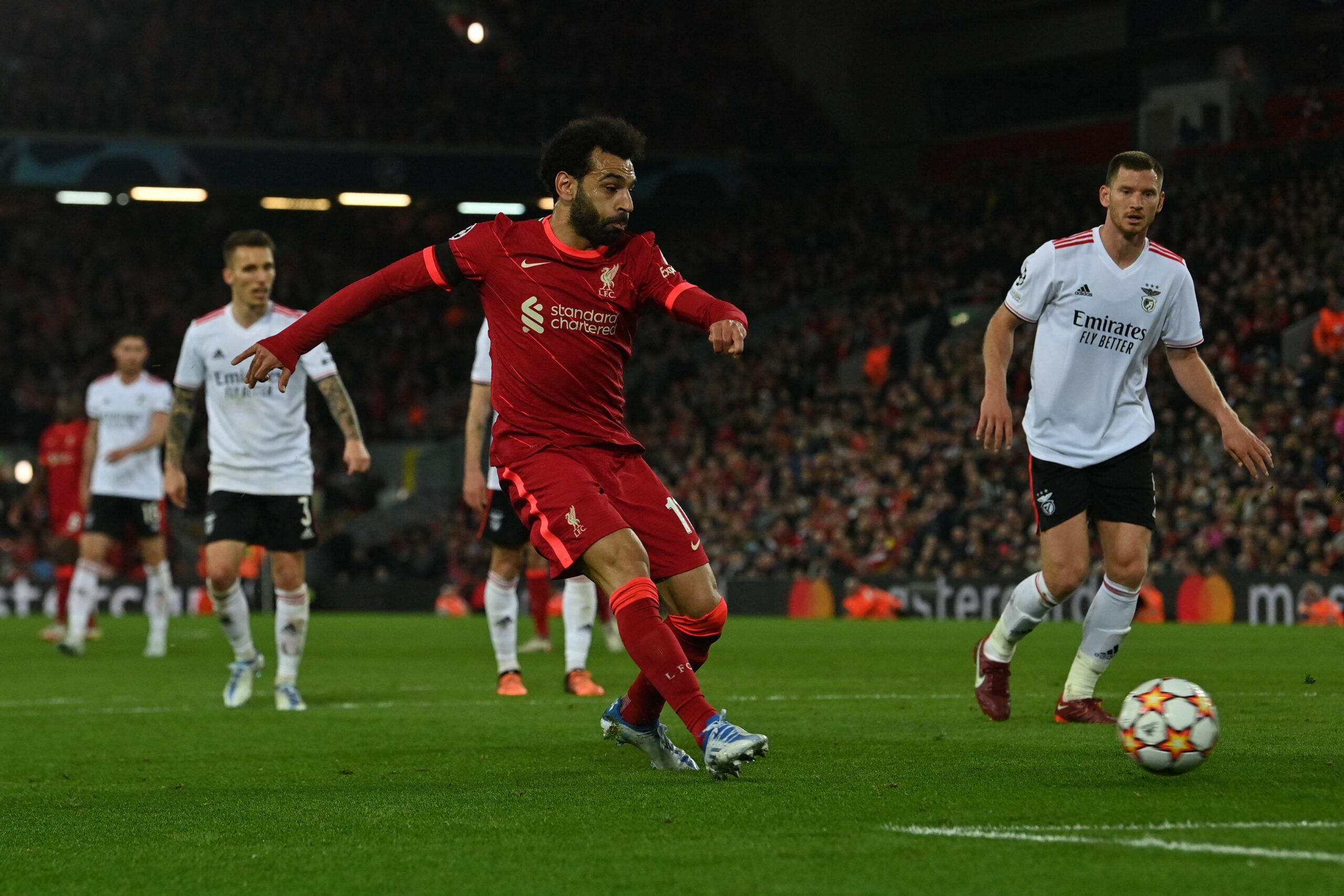 Liverpool's Egyptian midfielder Mohamed Salah shoots but he is offside during the UEFA Champions League quarter final second leg football match between Liverpool and Benfica at the Anfield stadium, in Liverpool, on April 13, 2022. (Photo by Paul ELLIS / AFP) (Photo by PAUL ELLIS/AFP via Getty Images)