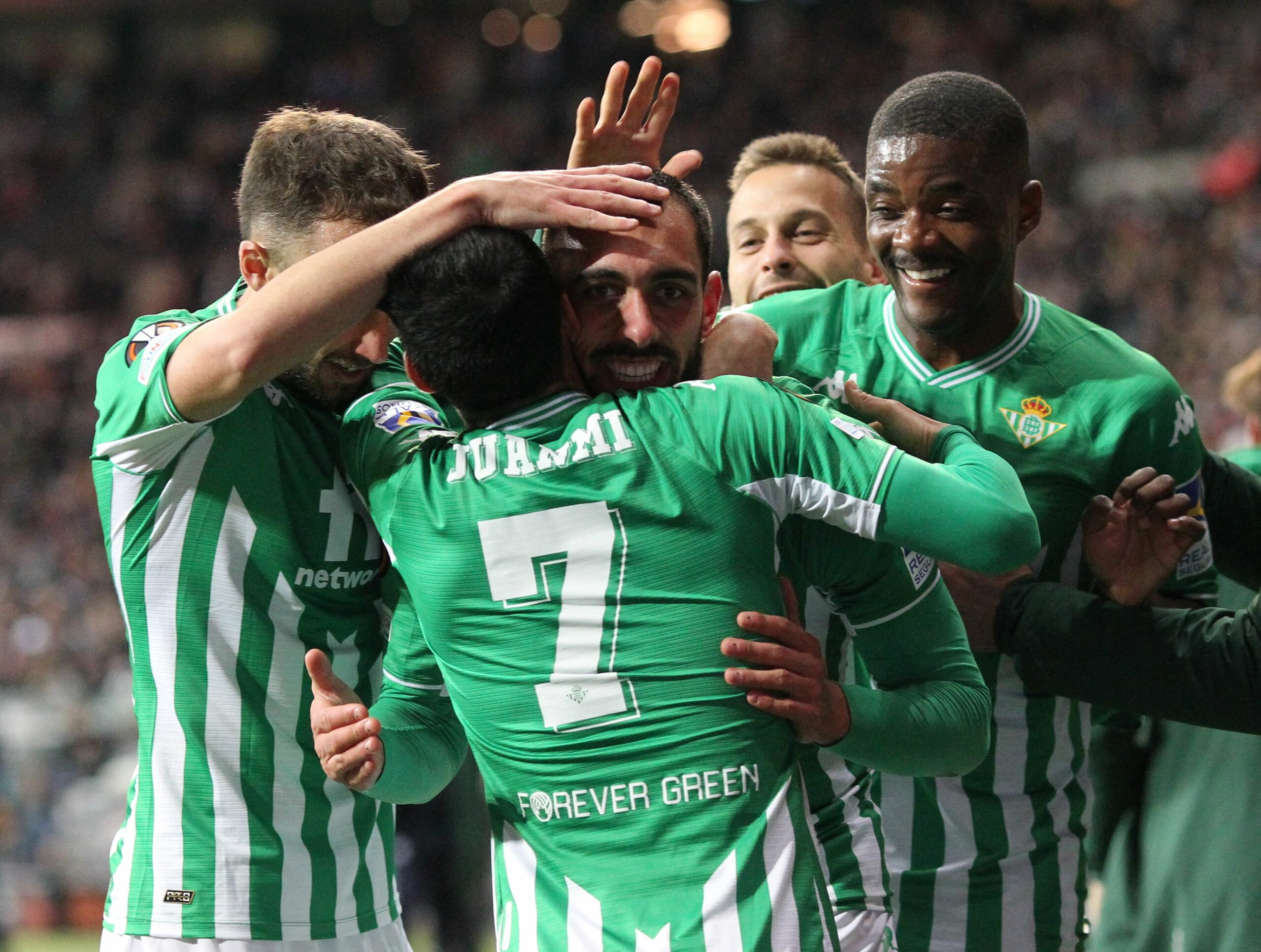 Real Betis' Spanish forward Borja Iglesias (C) celebrates scoring the opening goal with his teammates during the UEFA Europa League Last 16, 2nd-leg football match Eintracht Frankfurt v Real Betis in Frankfurt, western Germany, on March 17, 2022. (Photo by Daniel ROLAND / AFP) (Photo by DANIEL ROLAND/AFP via Getty Images)