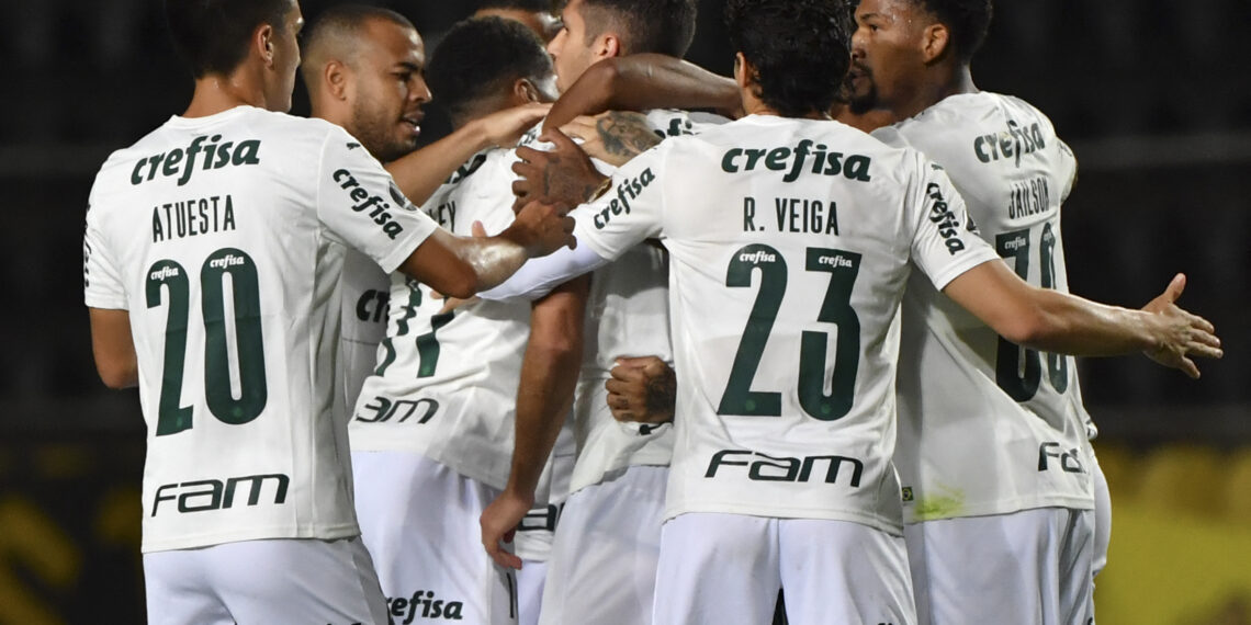 Brazil's Palmeiras players celebrate after scoring against Venezuela's Deportivo Tachira during the Copa Libertadores group stage first leg football match at the Polideportivo de Pueblo Nuevo stadium in San Cristobal, Venezuela, on April 6, 2022. (Photo by Federico Parra / AFP) (Photo by FEDERICO PARRA/AFP via Getty Images)