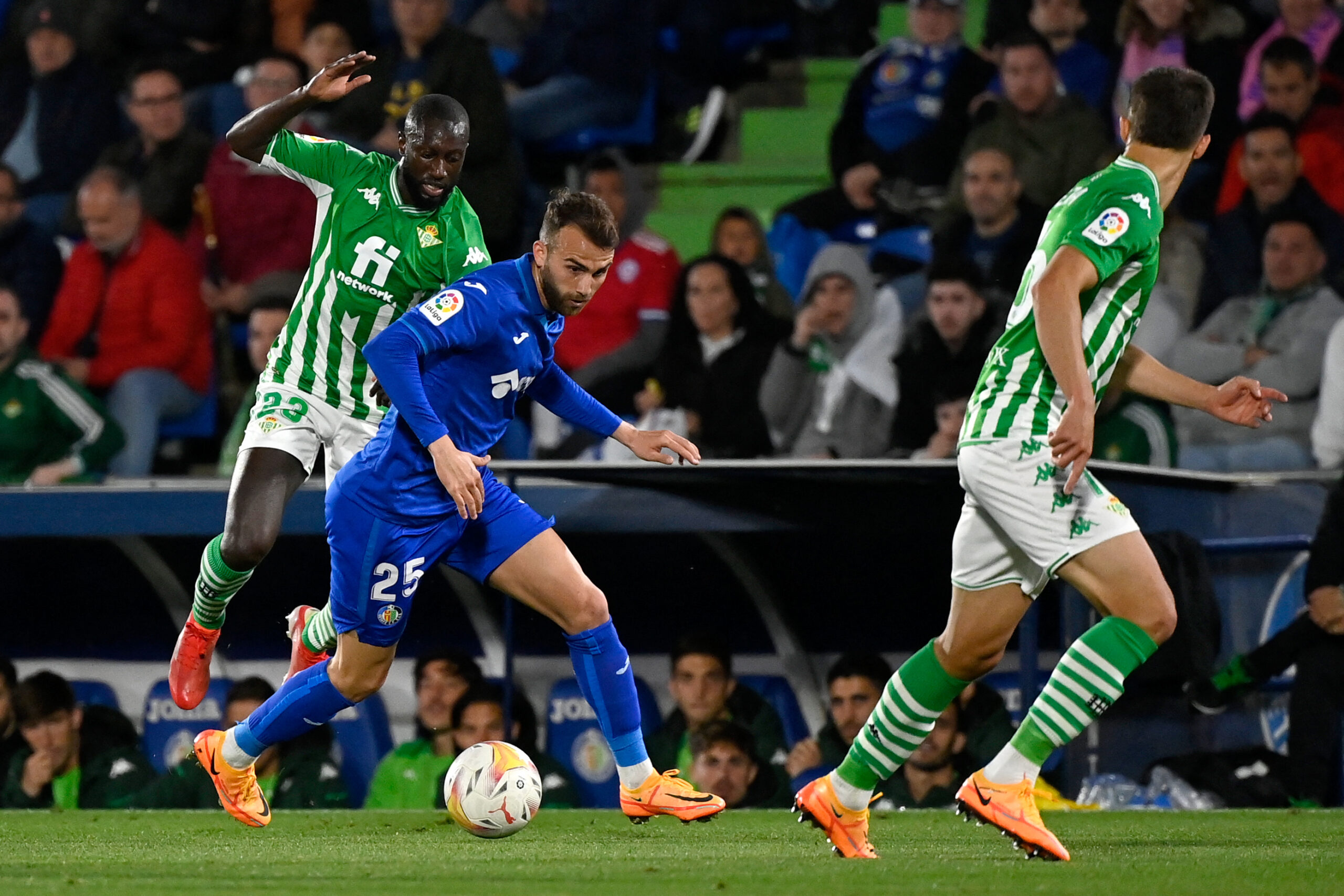 Real Betis' French-Senegalese defender Youssouf Sabaly (L) vies with Getafe's Spanish forward Borja Mayoral during the Spanish League football match between Getafe CF and Real Betis at the Col. Alfonso Perez stadium in Getafe on May 2, 2022. (Photo by PIERRE-PHILIPPE MARCOU / AFP) (Photo by PIERRE-PHILIPPE MARCOU/AFP via Getty Images)