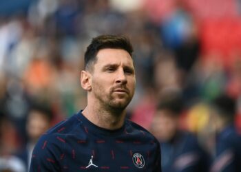 Paris Saint-Germain's Argentinian forward Lionel Messi looks on as he warms up prior to the start of the French L1 football match between Paris-Saint Germain (PSG) and ES Troyes AC at The Parc des Princes Stadium in Paris on May 8, 2022. (Photo by Anne-Christine POUJOULAT / AFP) (Photo by ANNE-CHRISTINE POUJOULAT/AFP via Getty Images)